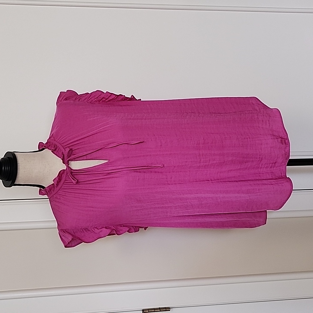 Cute ruffled pink sleeveless top